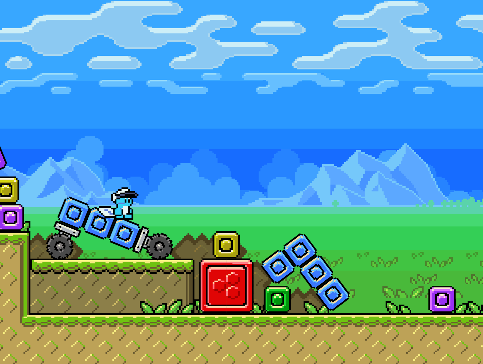 Blocky 2D game with piles of colored blocks, some stuck together and positioned off-grid. A small character with a hat and tail stands on some blocks that have wheels attached. In the background is a grassy field and distant mountains.